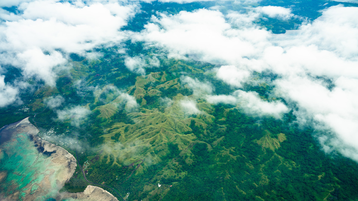 Aerial view of the green mountains on the island